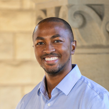 A professional portrait image of Dr. Christopher Barnes.