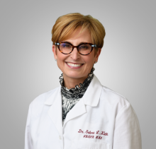 A professional portrait image of Dr. Sabra Klein.