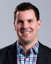 A professional portrait image of Dr. Timothy Hand.