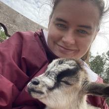 Cassidy Clark with a goat