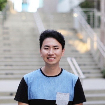 Liangdao Li standing in front of stairs