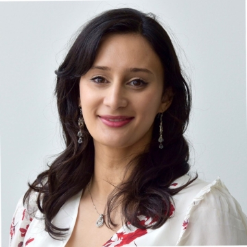 Noor Bala, women in a white shirt with flowers