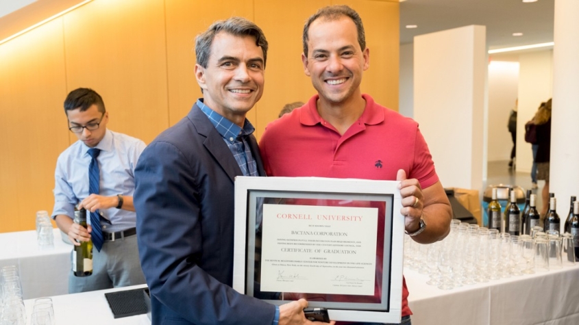 John Kallassy with Rodrigo Bicalho proudly show Bactana Corporation’s certificate at the McGovern Center’s graduation