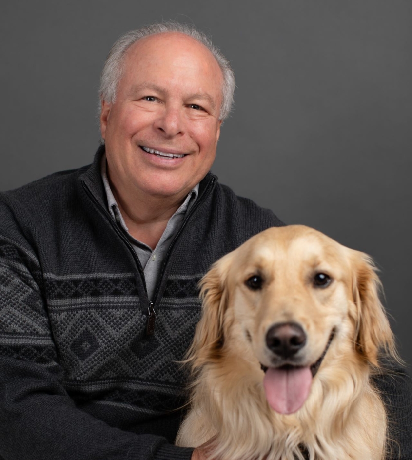 Barry Lissman and a golden retriever