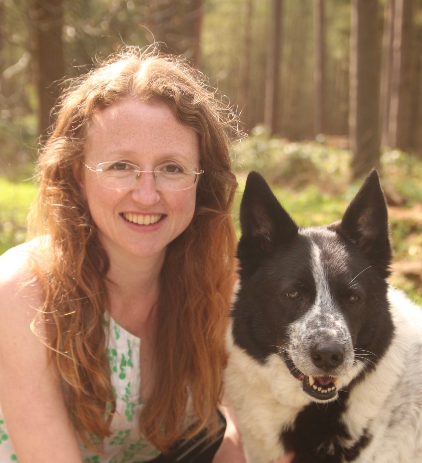 Sarah Caddy (left) with her black and white dog (right)