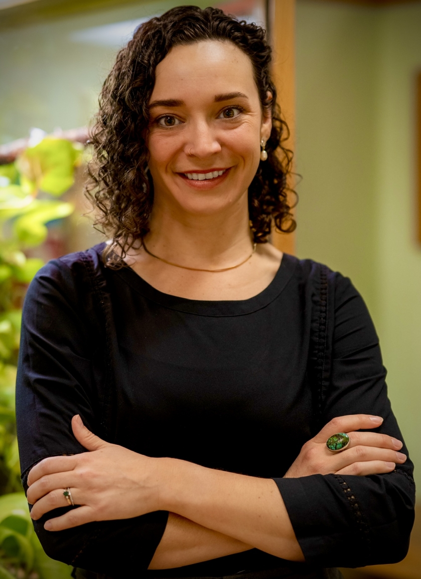 Katherine Vissio posing with crossed arms