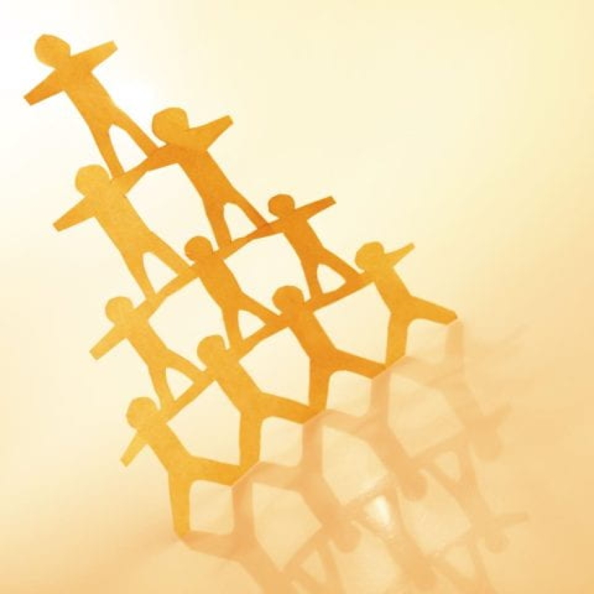 image of paper cutout people in a pyramid