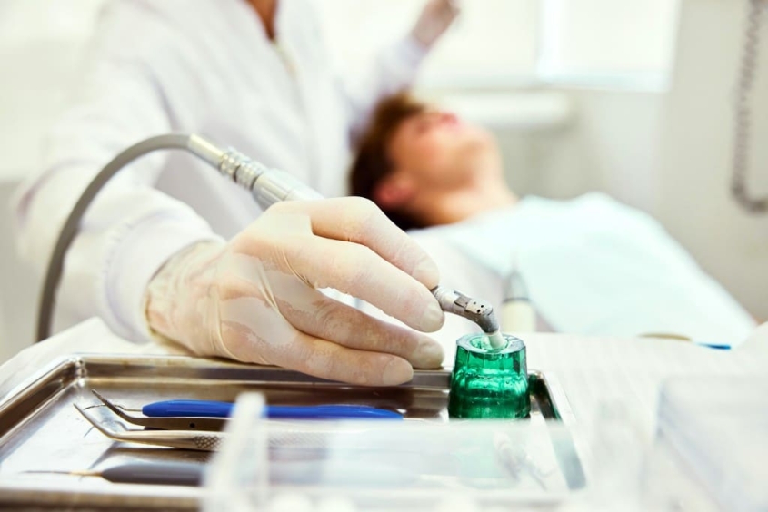 person in dentist's chair