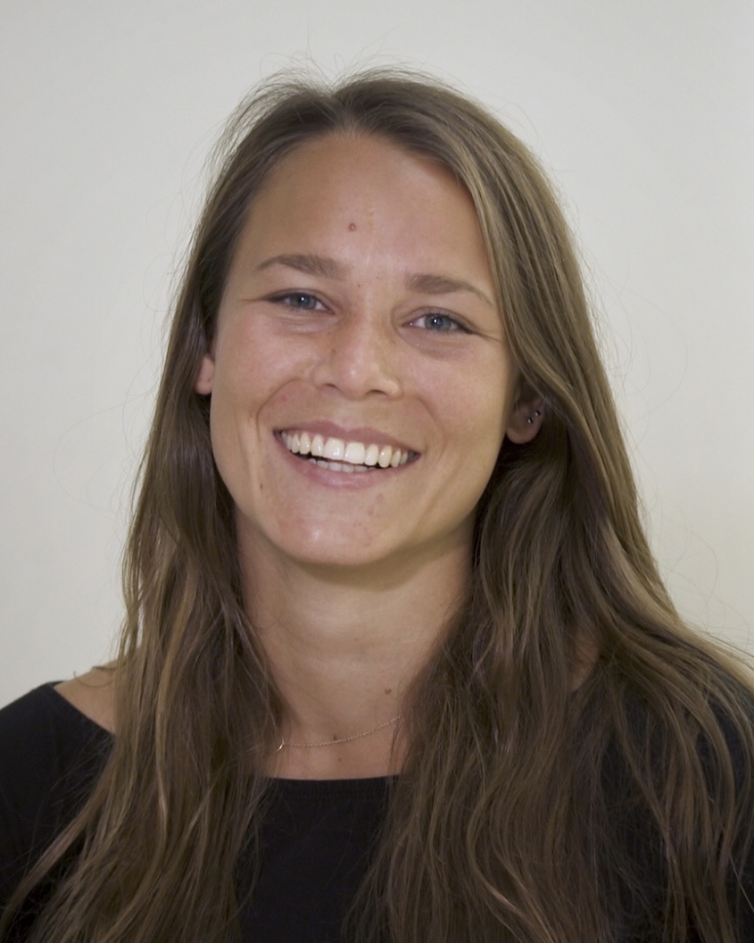 Portrait photograph of resident Dr. Anna Voigt smiling at the camera