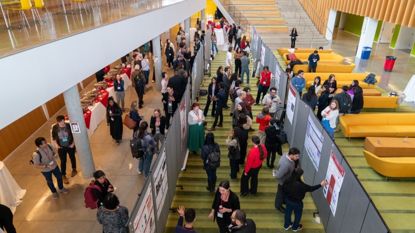 Conference poster session in Takoda's Atrium.