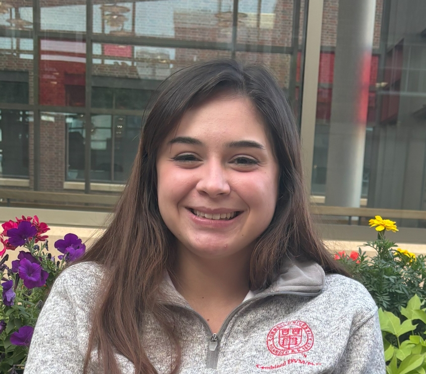 Grace Gonzalez smiling in a cornell gray sweatshirt