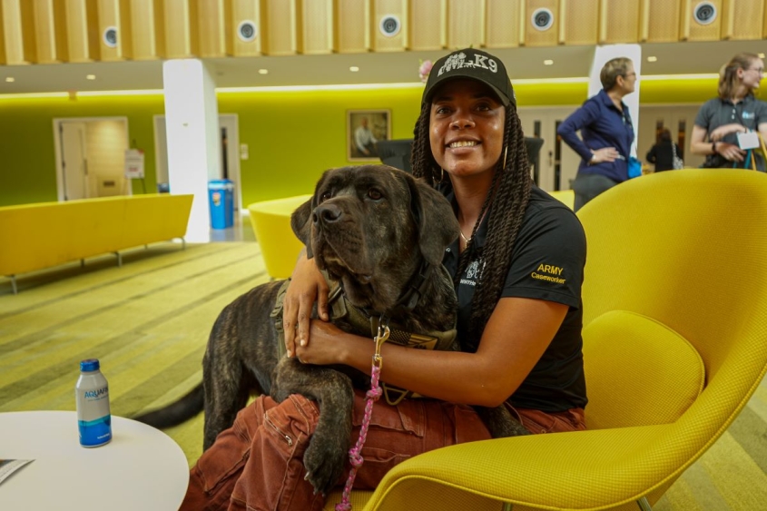 woman hugging dog
