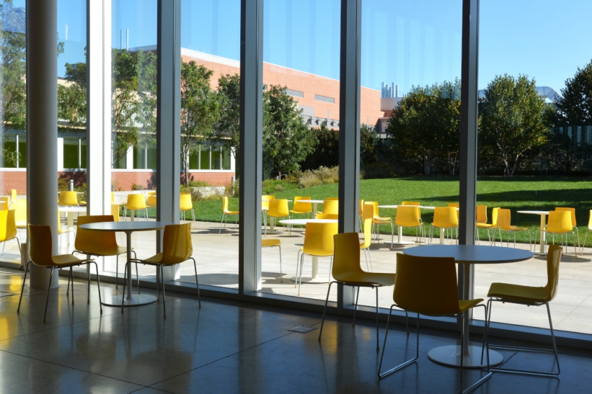 tables in an indoor and outdoor dining area