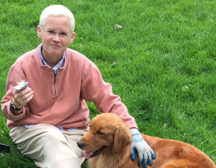 Veterinarian with golden retriever