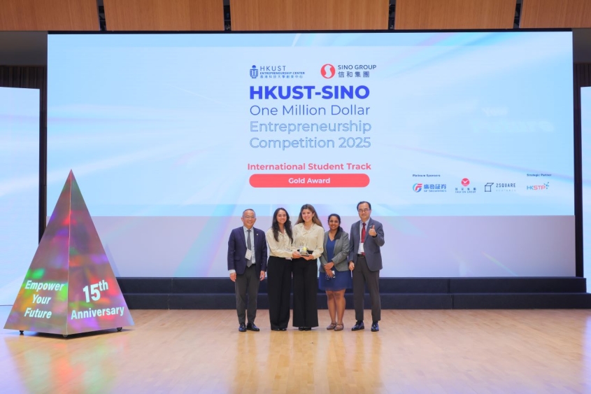 students receiving award on stage