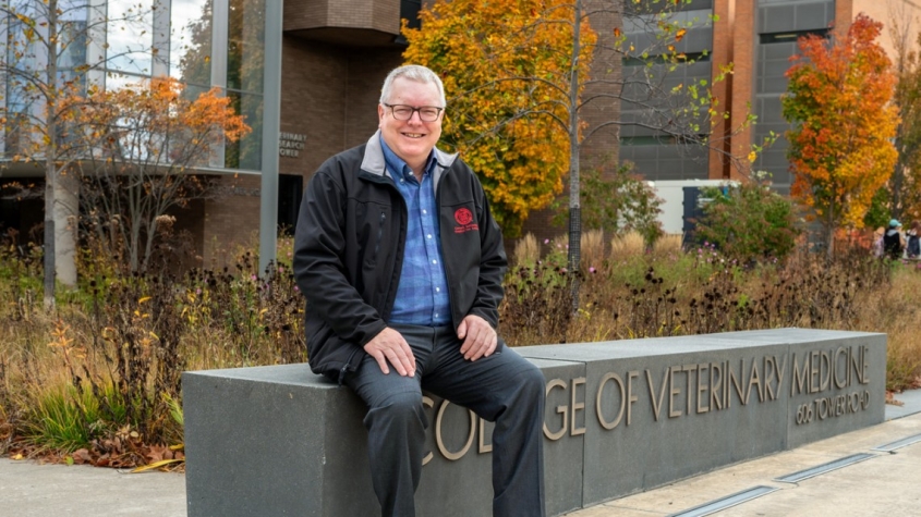 Dean Lorin Warnick sitting outside of CVM