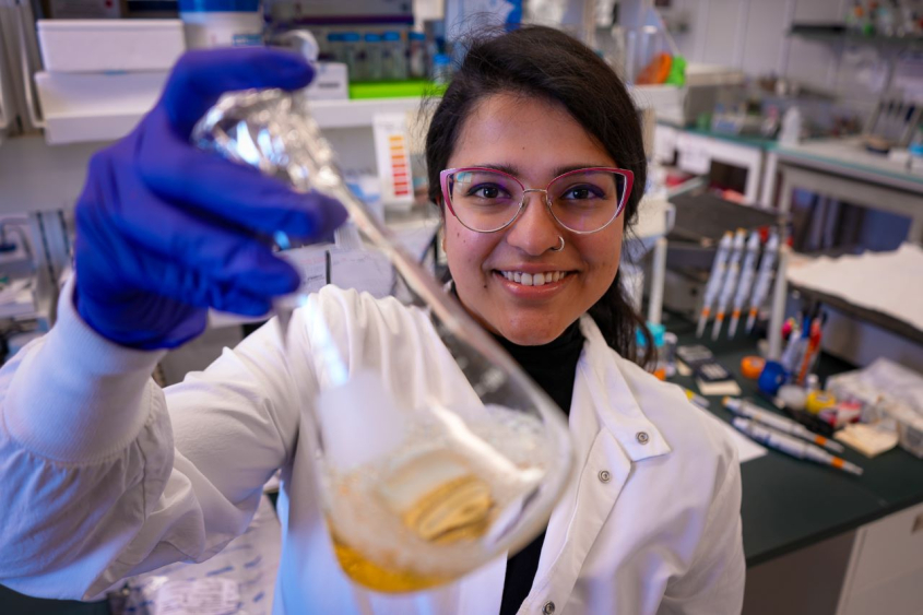Scientist holding a beaker