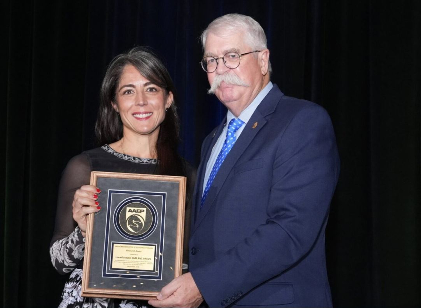 Liara Gonzalez receiving an AAEP award