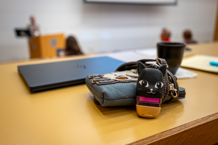 A cat inspired hand sanitizer sits out in a Cornell lecture hall. 