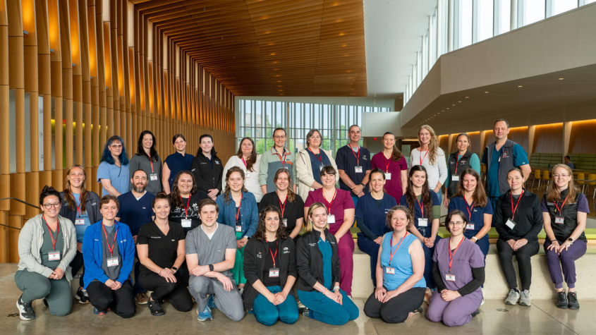 The entire cohort of MSKamp participants pose together in the atrium