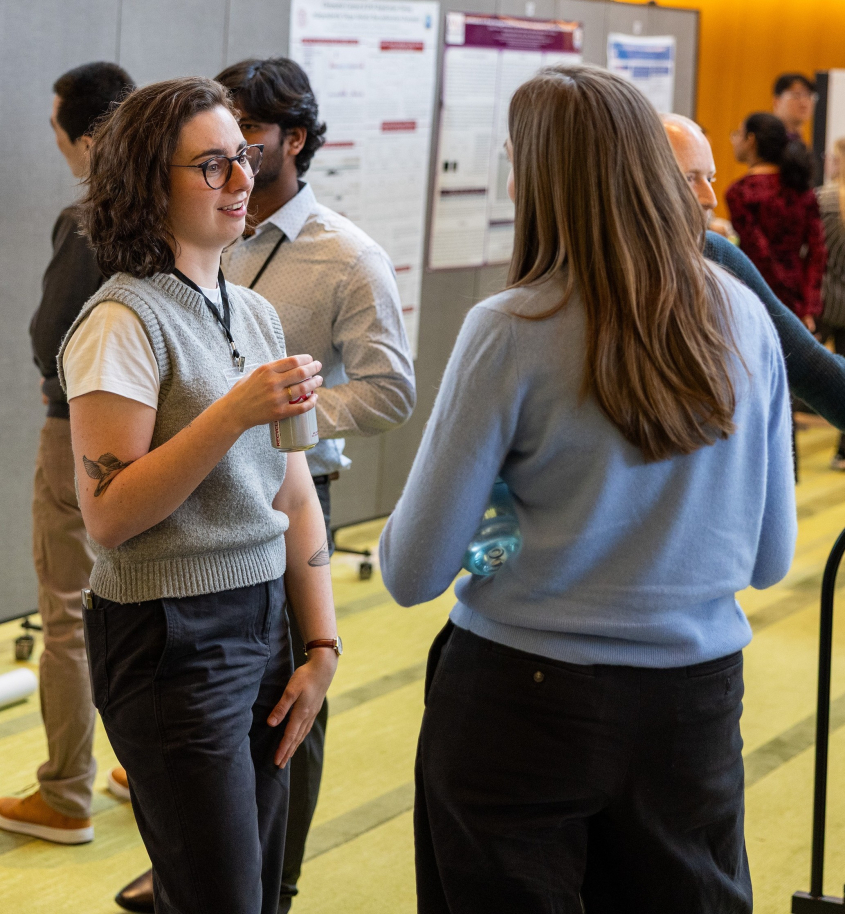 Students presenting posters in the CVM Atrium
