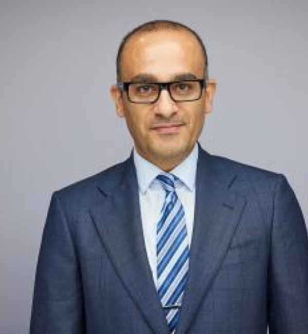 man in blue suit and tie
