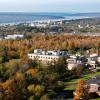 Baker Institute from the air with Cayuga Lake in the distance