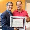 John Kallassy with Rodrigo Bicalho proudly show Bactana Corporation’s certificate at the McGovern Center’s graduation