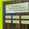 A plaque noting the winners of the Dionne Henderson Staff Excellence Award