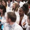 DVM students sit in Bailey Hall for their White Coat Ceremony