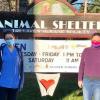The FARVets team poses in front of the Tri-Lakes Humane Society Animal Shelter sign