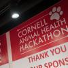 A sign that says "Animal Health Hackathon"