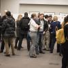 Attendees to the symposium at the poster session